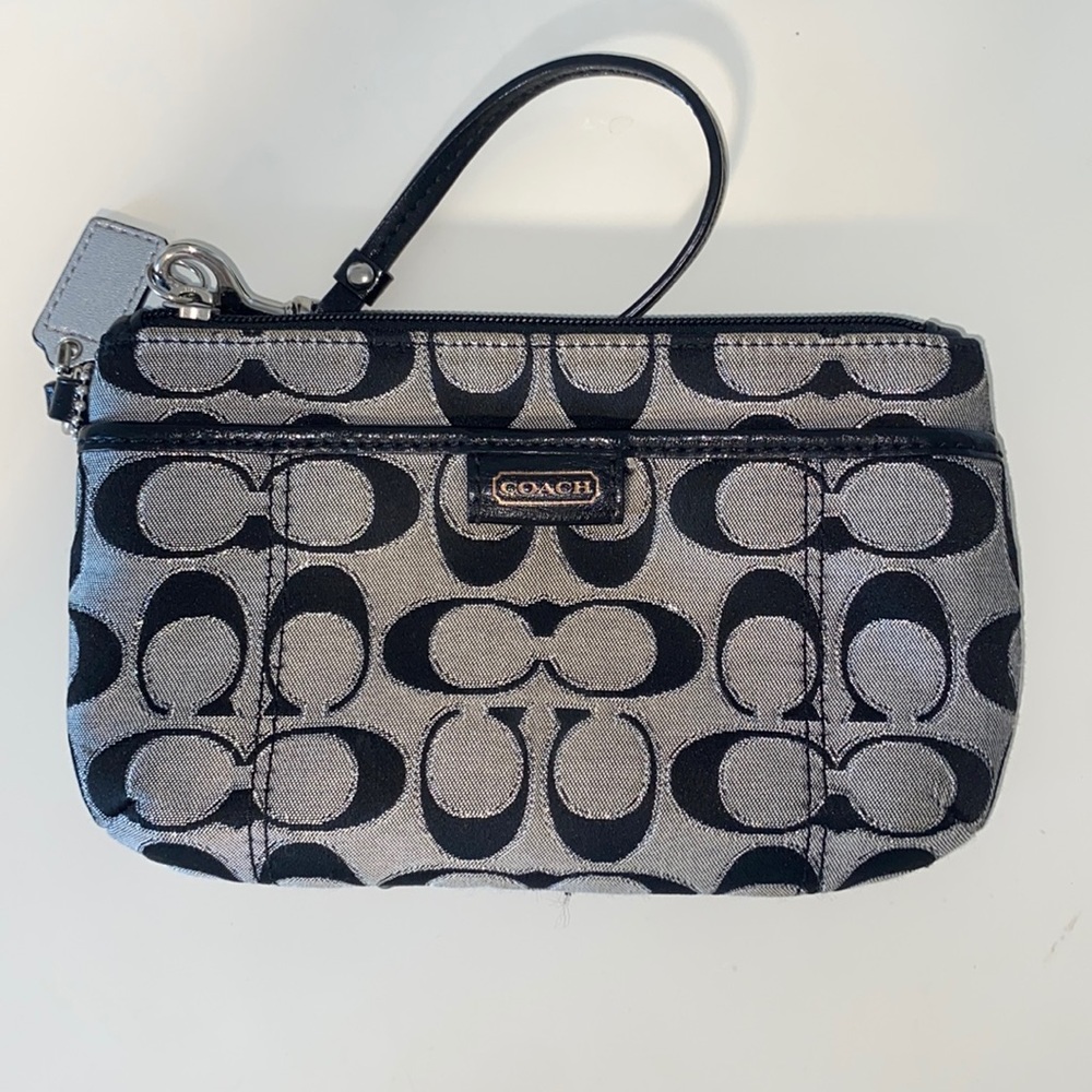 Silver and black coach handbag